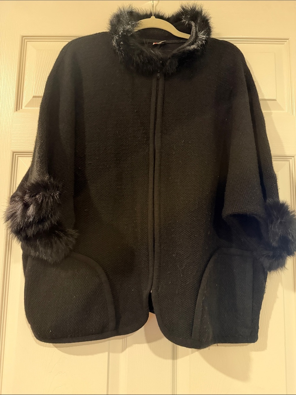 Knitted Black Coat Jacket with faux fur collar and cuff sleeves. Front zipper.